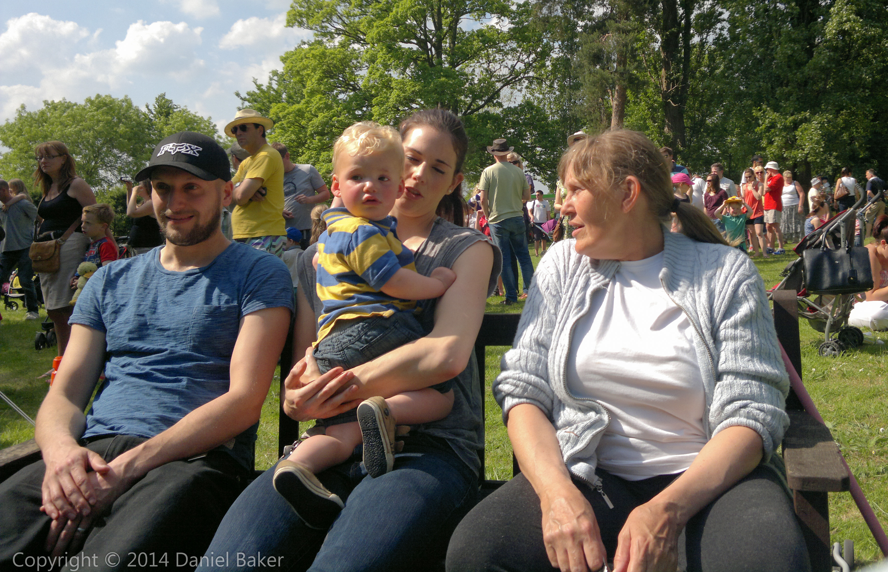 Mum, Theo, Kirsten and her husband sitting on a bench