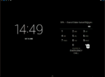 A black Android lockscreen with custom mouse pointer icon