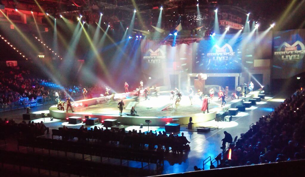 Marvel superheroes on stage with bright colourful spotlights at Marvel Universe Live