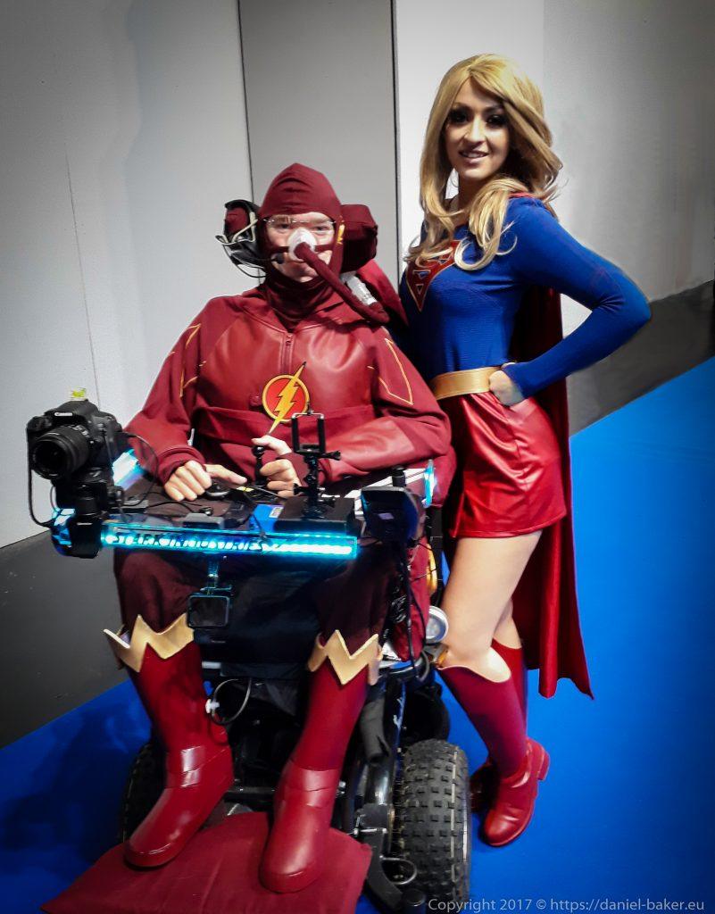 Daniel Baker dressed as The Flash with Tabitha Lyons standing next to him dressed as Supergirl at MCM Comiccon November 2017