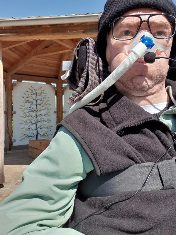 Daniel Baker selfie in green coat with black gillet