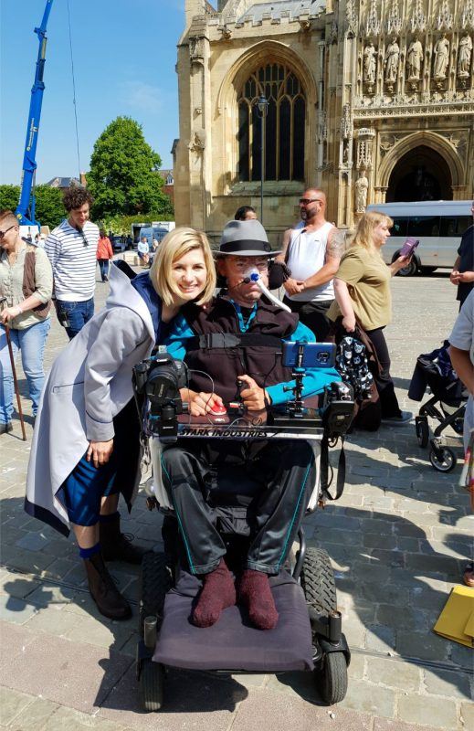 Dr Who Jodie Whittaker with Daniel Baker in front of Gloucester Cathedral