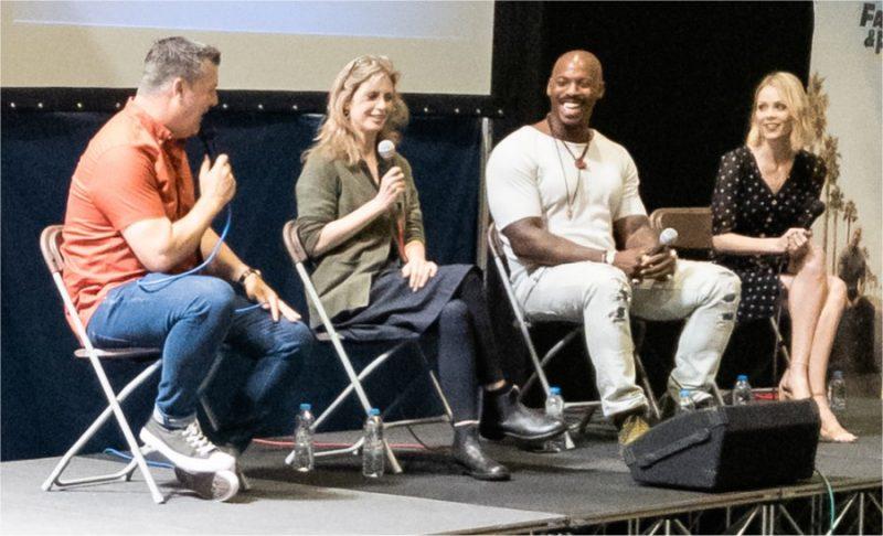 Helen Slater, Laura Vandervoort and Mehcad Brooks on stage at Collectormania 26