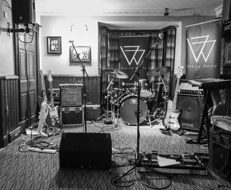black and white image of the bands instruments before Verity White's Gig at the Cotswold Inn