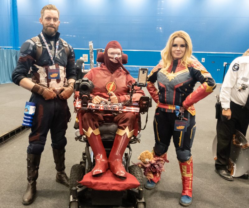 Geekmania Gloucester Daniel Baker dressed as The Flash with Captain America and Captain Marvel cosplayers
