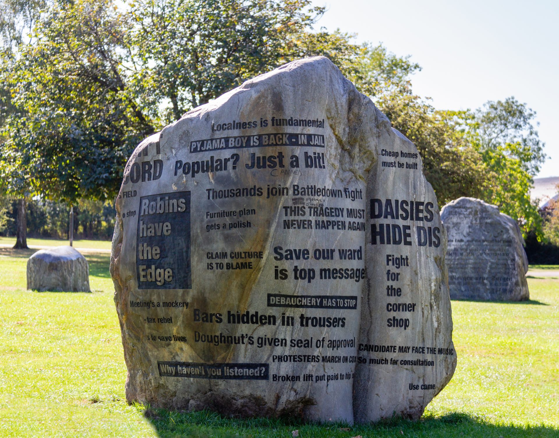 Modern standing stones with codes carved on them at Hesters way park behind GCHQ