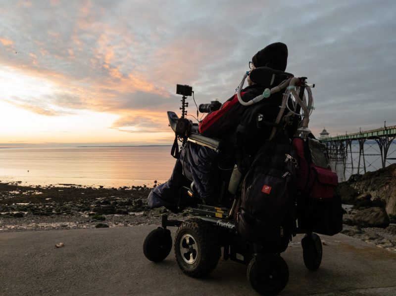 Silhouette of Daniel baker watching a sunset next to Clifton pier