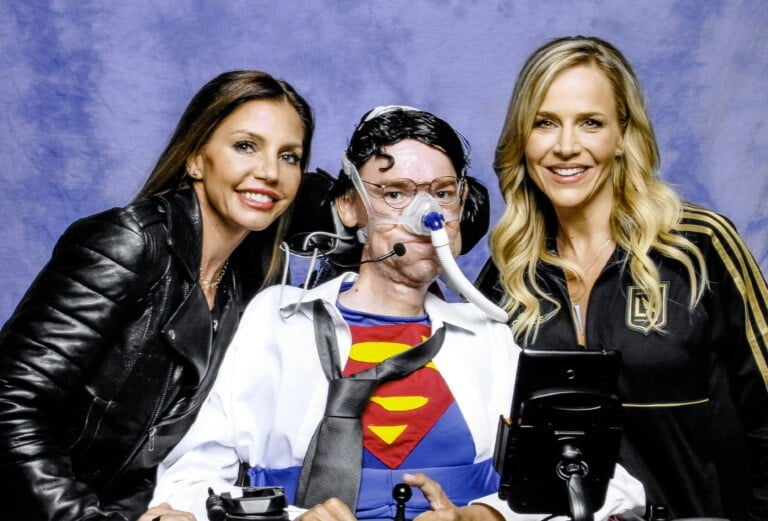 Julie Benz and Charisma Carpenter with Daniel Baker dressed as Clark Kent