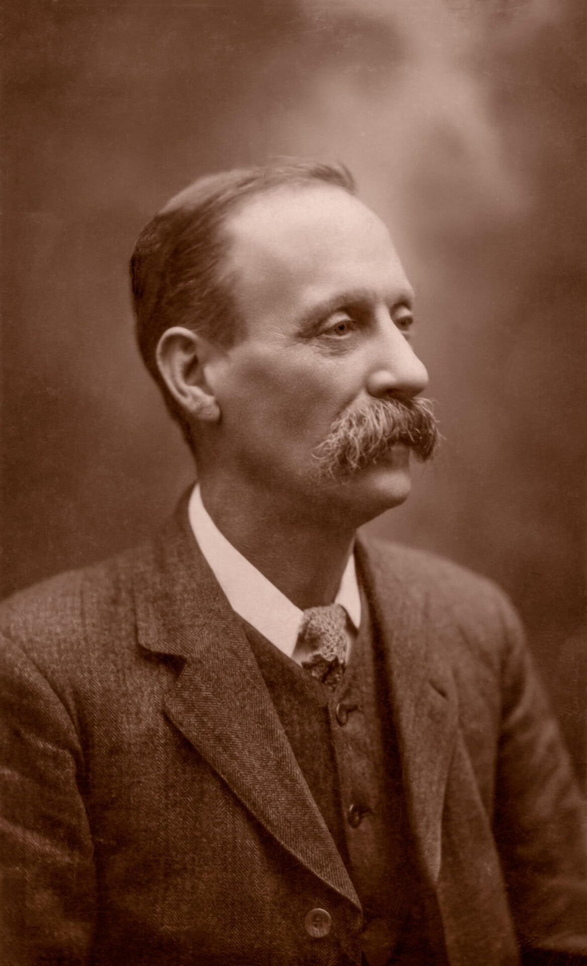 Sepia portrait photo of a man with a large moustache from Restored Photo Album 4