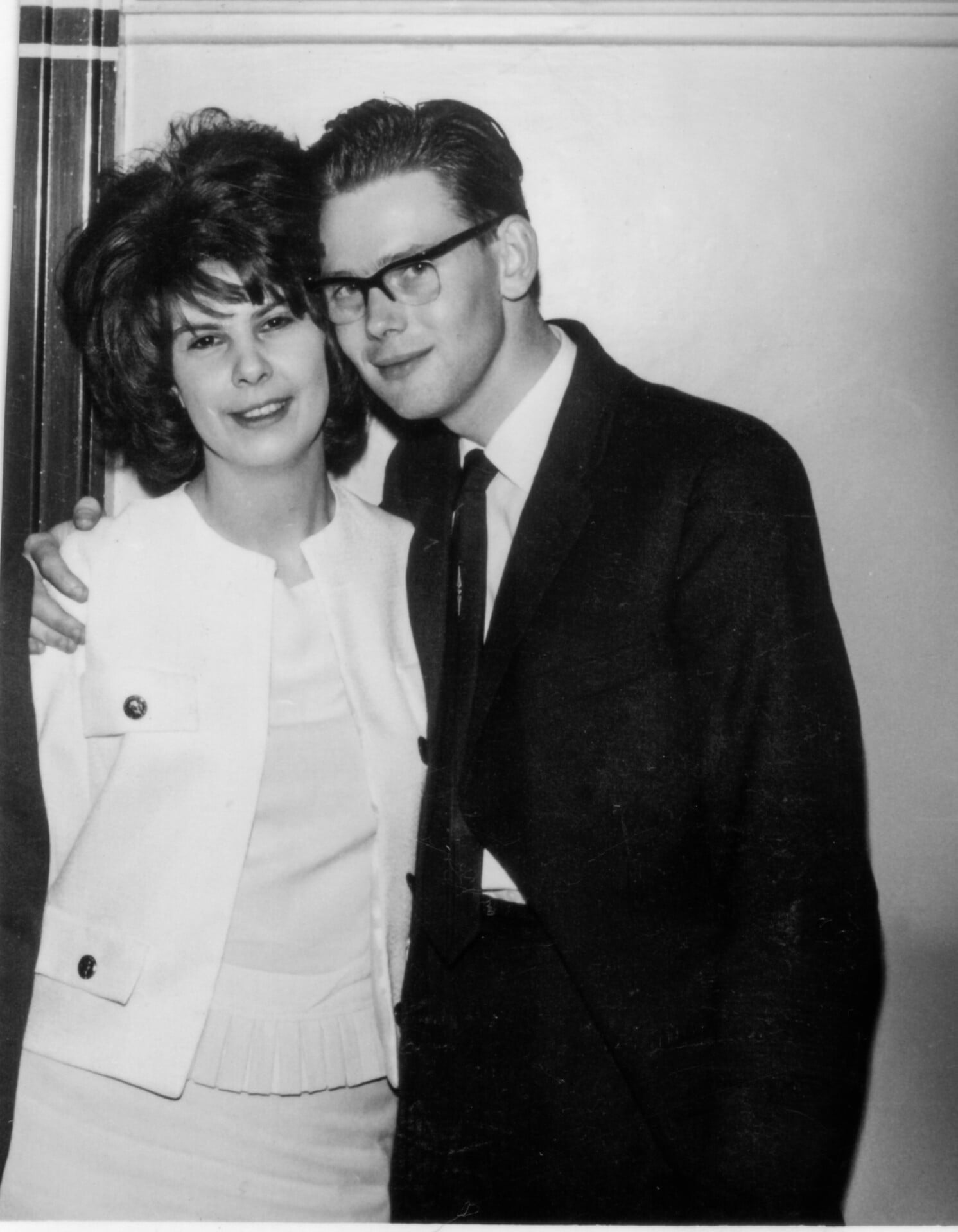 A black and white photo of a couple