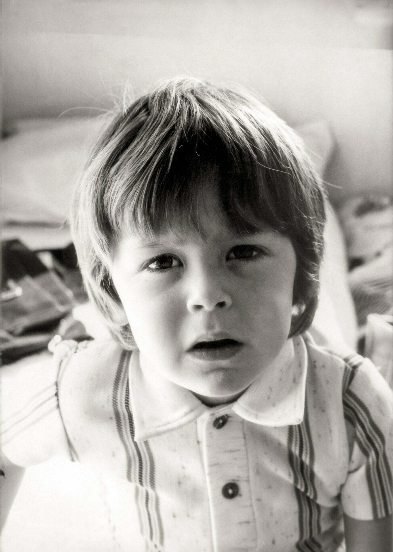 Black and white photo of a very young Daniel Baker