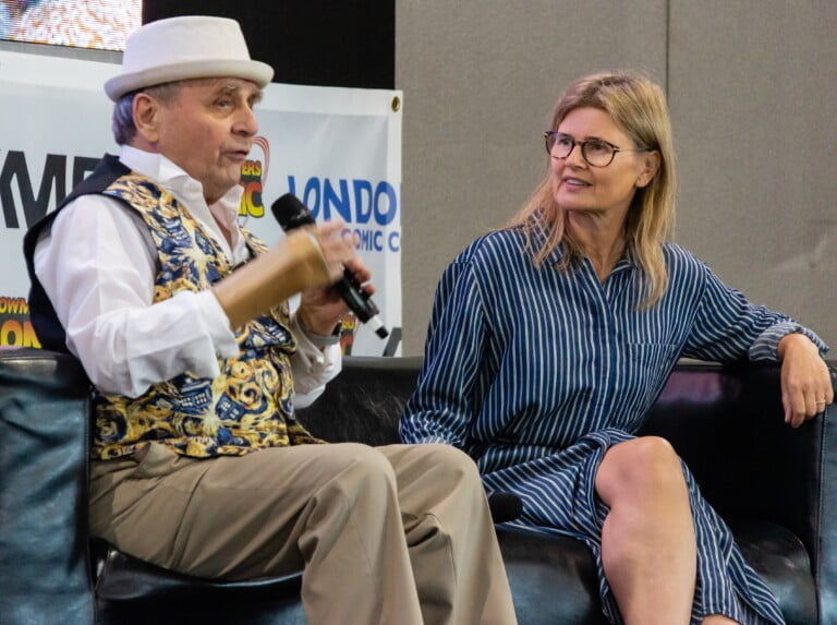 Sylvester McCoy and Sophie Aldred talking on stage